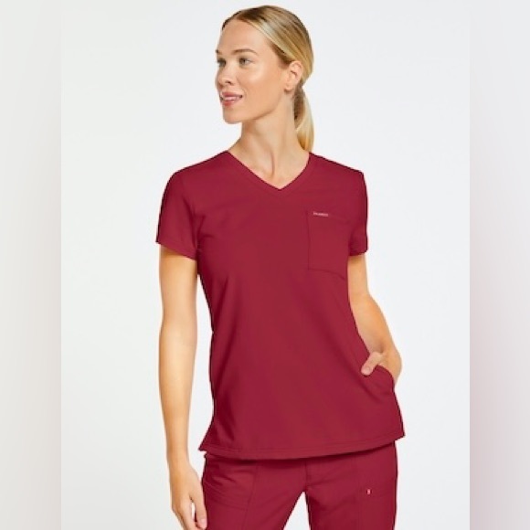 Jaanuu Tops Jaanuu Scrub Top Size S In Wine Poshmark